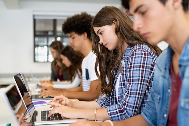 High school students working on computers