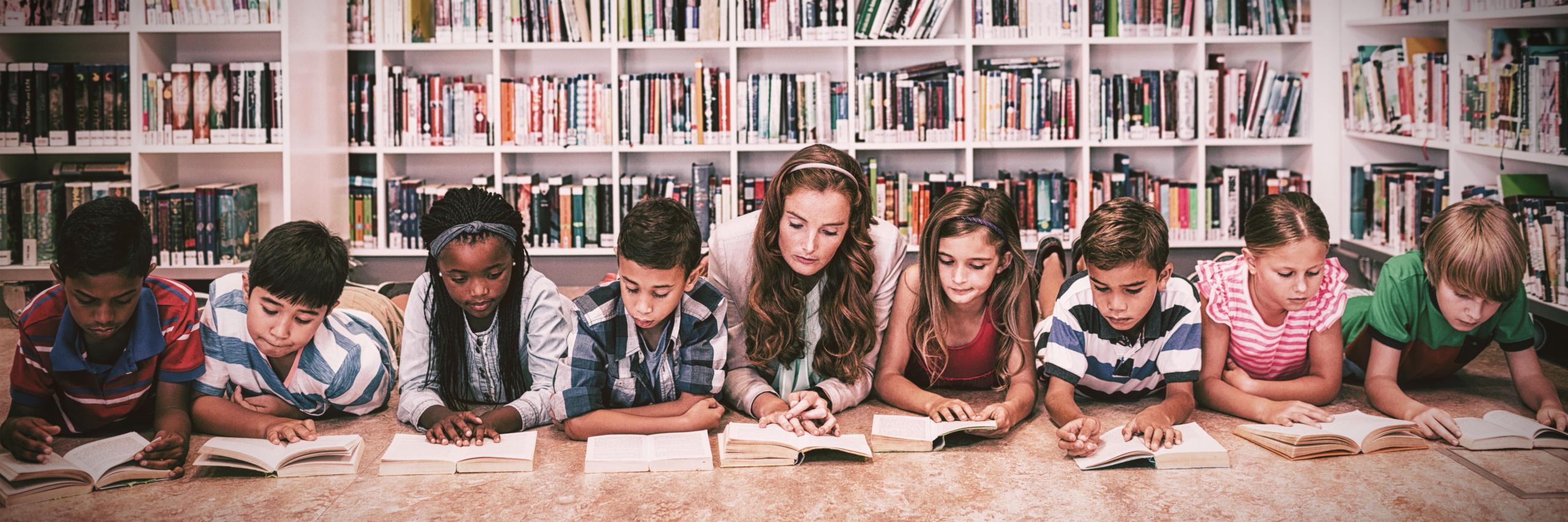 Teacher conducting close reading with a group of students